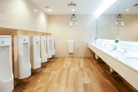 Toilet sink interior of public toilet with of washing hands and mirror